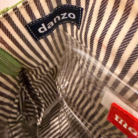 Danzo Diaper Bag in Green and tan with multiple compartments inside - Picture 11 of 11